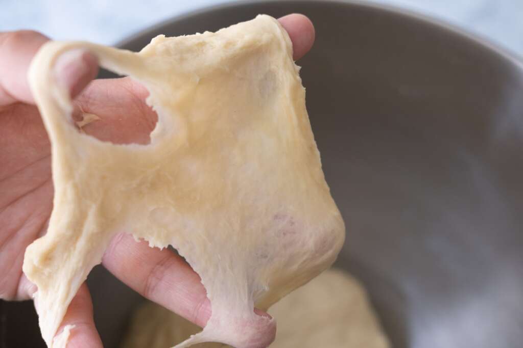 Knead dough with a stand mixer. 