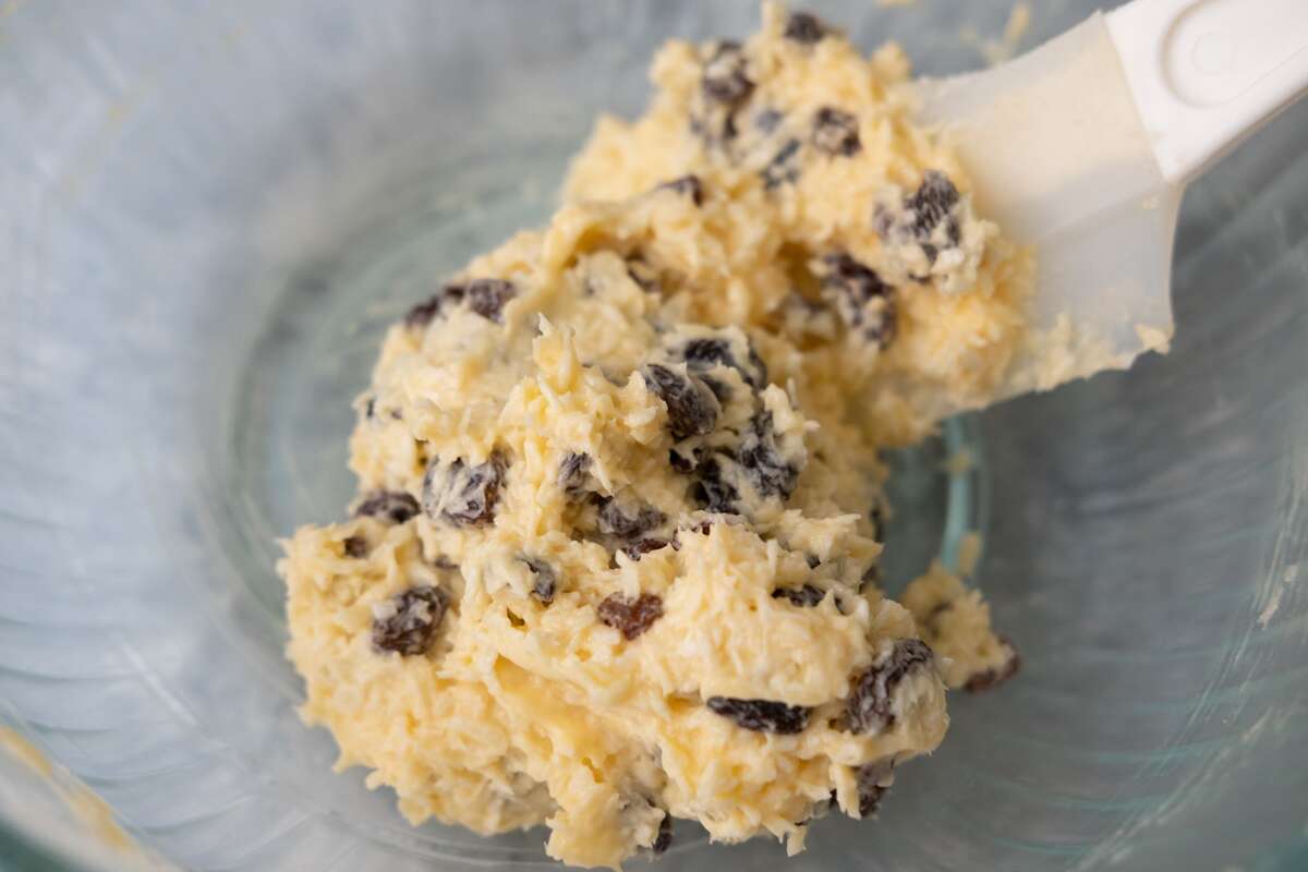 Buttery raisin coconut filling mixed in a bowl.