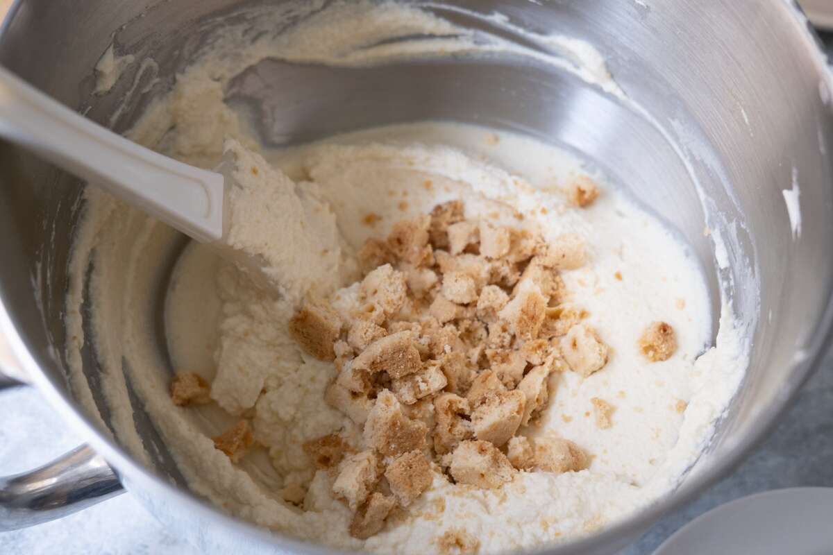 Whip the heavy cream to stiff peak, then add mascarpone cheese and crushed cookies. 